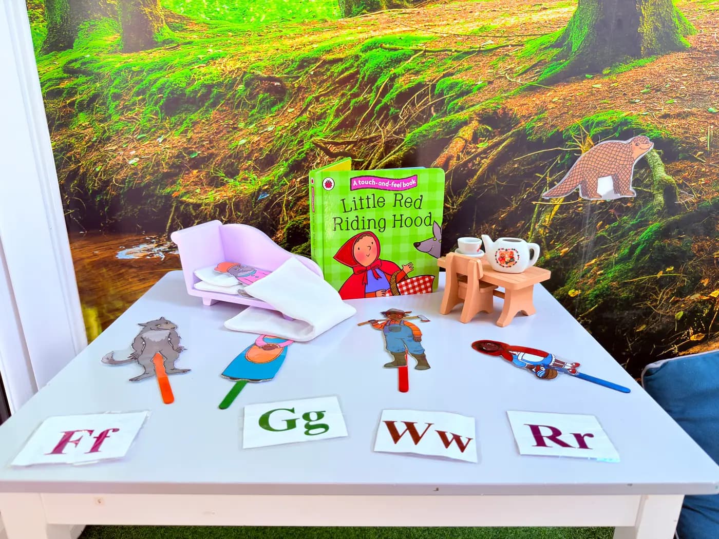 Phonics and letter-recognition activity laid out on a table at Blue Nest Montessori Harrow