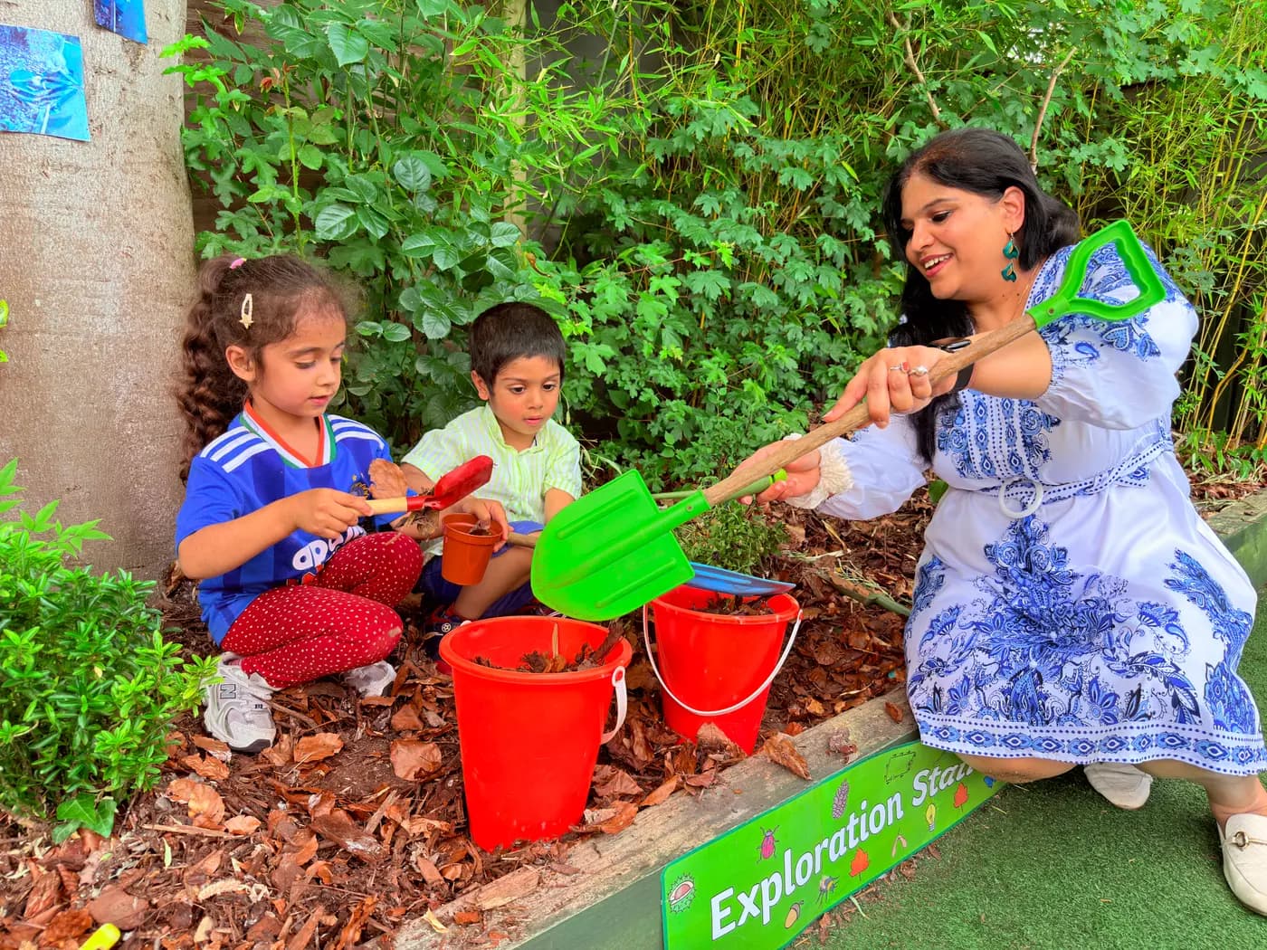 A child exploring the outdoor garden at Blue Nest Pinner